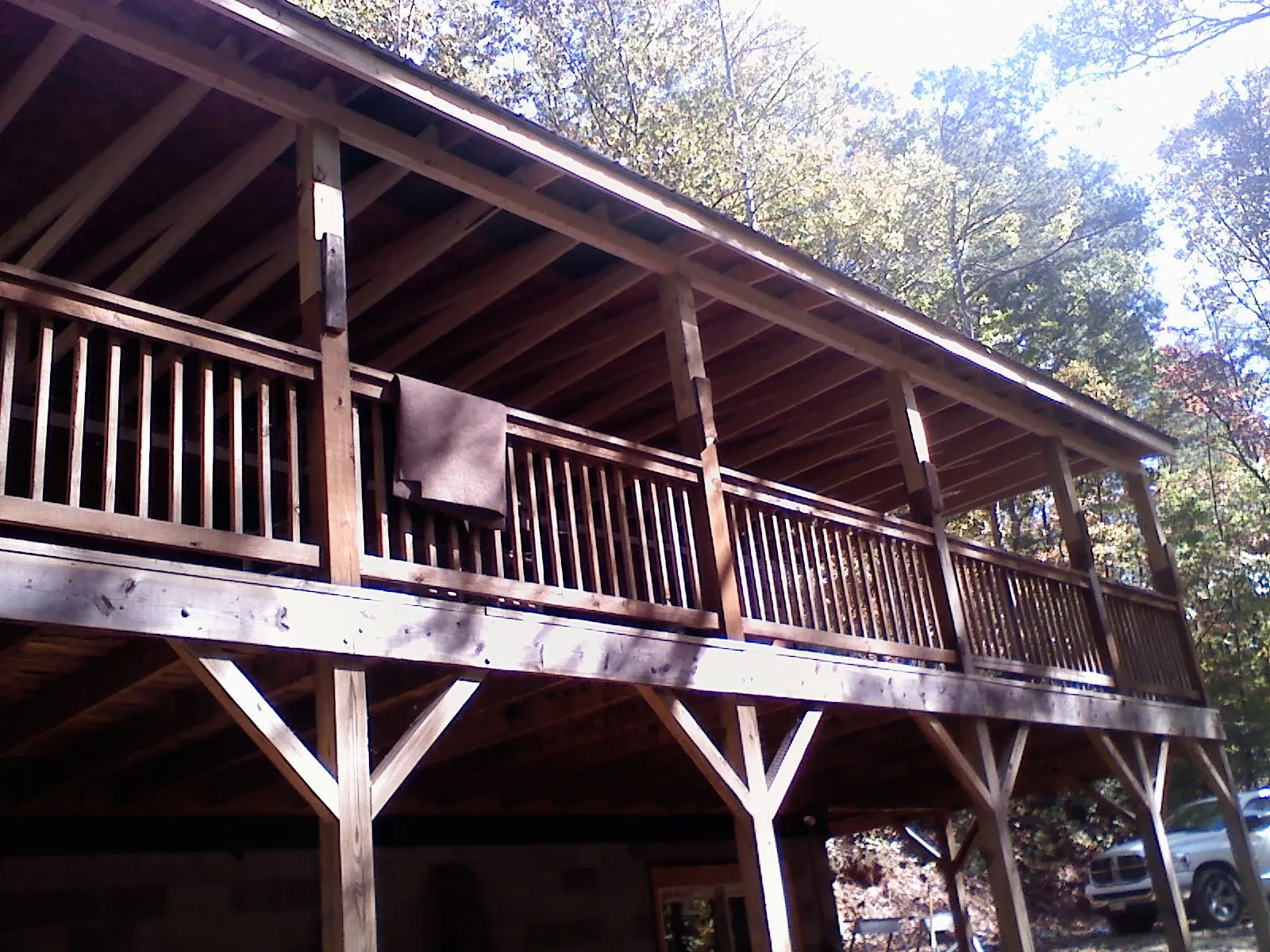 Timber framing under a new elevated porch and deck — Roof Leak Repair in Glencliff by Roofing Brothers